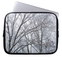 Snow-covered Oak Tree laptop sleeves