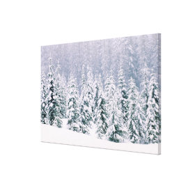 Snow covered pine trees canvas prints