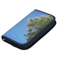 Snow-tipped Pine Tree on Blue Sky planners