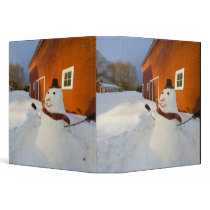 Snowman in front of red barn in Columbia Falls Binder