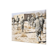 soldiers respond to a small arms attack canvas print