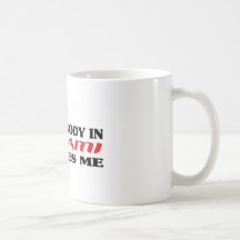 Somebody in Miami loves me t shirt Mugs
