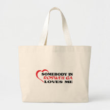 Somebody in Roswell loves me t shirt Bags
