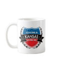 Someone In Kansas Loves Me mugs