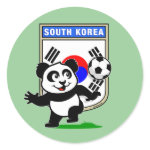 This adorable little panda is too cute! He's featured in front of a large flag from South Korea and ready to play football and score some goals. This cute design is perfect for football players and soccer fans.