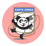 This adorable little panda bear is too cute! Featured in front of a large flag from South Korea, this panda is getting ready to do a rhythmic gymnastics routine with a gymnastics ribbon! This cute design is perfect for gymnasts and gymnastics fans.
