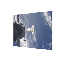 Space Shuttle Atlantis and a Russian spacecraft Canvas Print