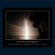 Space Shuttle Atlantis arcs into the still black posters