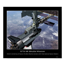 Space Shuttle Atlantis docked with posters