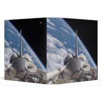 Space Shuttle Discovery backdropped by Earth Vinyl Binder