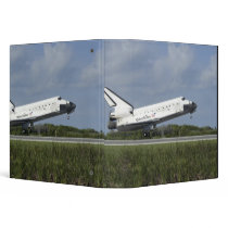 Space shuttle Discovery lands on Runway 33 Binder