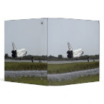 Space Shuttle Discovery touches down 3 binders