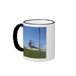 Space shuttle Endeavour is framed by a windsock Mug