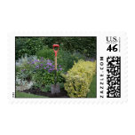 Spade in flower bed postage