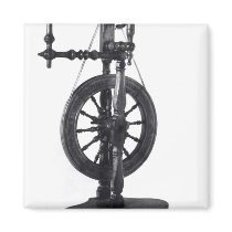 Spinning wheel fridge magnet