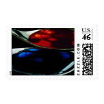 Spoons with blue and red liquid stamp