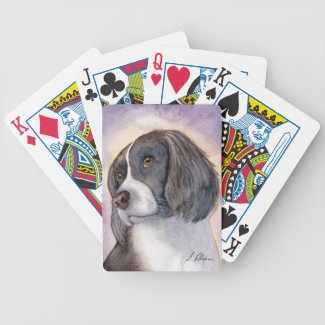Springer spaniel waiting for walk playing cards
