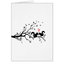 Squrrels with red hearts on tree branch greeting card