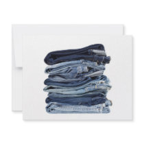 Stack of blue jeans invites