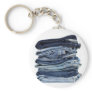 Stack of blue jeans key chains