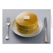 Stack of pancakes with butter on a plate cards