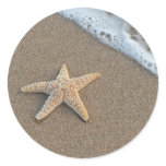 Starfish by the beach round sticker