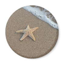 Starfish on the beach refrigerator magnet