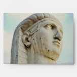 Statue head envelopes