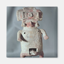 Statuette of a woman giving birth magnets