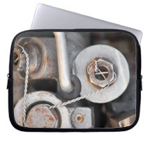 Steampunk nuts and bolts with wire laptop computer sleeves
