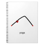 Stick figure of downward dog pose with yoga text. spiral notebooks