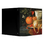 Still life of an orange binders