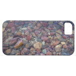 Stones in the lake at Glacier National Park iPhone 5 Cases