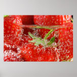 Strawberries in water with bubbles posters