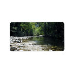 Stream flowing through trees labels