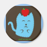stuff on my cat - apple on head fridge magnets