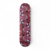 Stuffed animals at amusement park skateboard deck