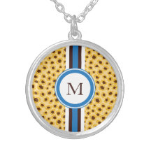 Stylish yellow cheetah print with monogram necklaces