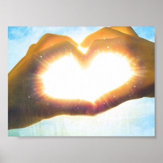 spiritual love symbolized by sun light shining through fingers that form a heart shape poster print pic