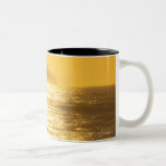 Sun path [reflections] from low evening sun over coffee mug