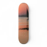 sun set on the water skate board
