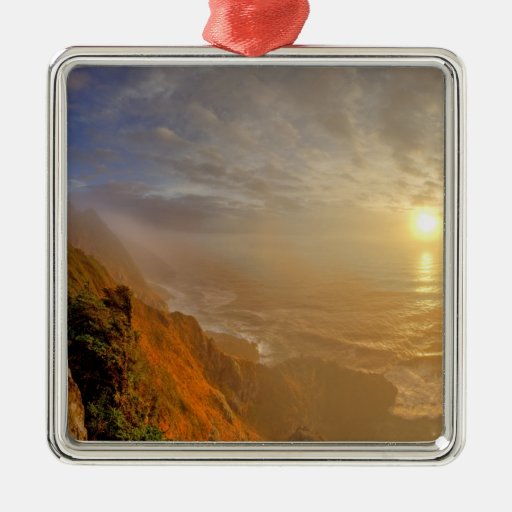 Sun sets over the Pacific Ocean from Heceta Christmas Tree Ornaments