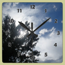Sun Through The Clouds wall clocks