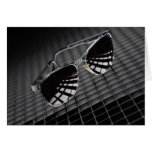 Sunglasses on grid background greeting card