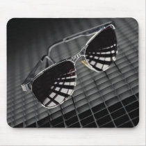 Sunglasses on grid background mousepads