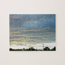 Sunlight reflected from the ocean lights up cloud puzzle