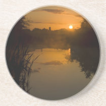 Sunrise by a lake coasters