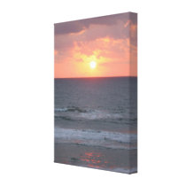 Sunrise on the beach Wrapped Canvas