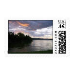 Sunrise over river postage stamp