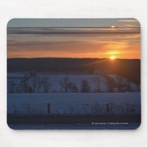 Sunrise over snow mouse pad